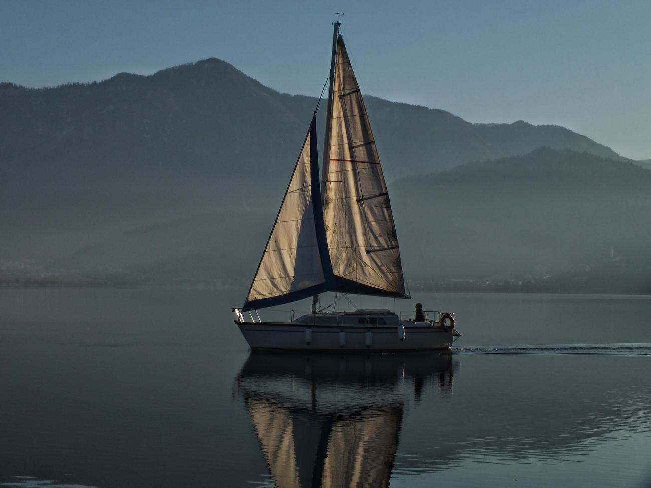 how do sailboats sail into the wind