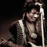 Step into the vibrant world of Jimi Hendrix, a legendary guitar maestro who left an indelible mark on the music universe. Prepare to be mesmerized as we unravel the fascinating secrets behind this enigmatic rock icon. From his experimental roots to his electrifying live shows, we'll uncover the untold stories and little-known details that made Hendrix a true musical enigma. Get ready to explore the genius behind his innovative riffs and the reasons why he remains one of the most beloved and influential guitarists of all time. Jimi Hendrix Fun Facts Ever have a dream so wild it inspired a song? Jimi Hendrix did! He claimed that some of his most famous tunes, like "Purple Haze" and "Third Stone from the Sun," were sparked by crazy dreams he had. Jimi Hendrix didn't even read music! It's hard to believe, considering he completely changed the game for guitarists everywhere. But that's part of what made him so special. He experimented, taught himself, and found totally new sounds and ways to play. Speaking of unique, ever notice how Jimi played the guitar? He actually flipped a right-handed guitar upside down and restrung it for a lefty! That's why he had such a distinct look and sound onstage – nobody else did it quite like that. "Excuse me while I kiss this guy?" Okay, so that's not the real lyric in "Purple Haze," but it's a funny misinterpretation that stuck around. The actual line is "Excuse me while I kiss the sky," but hey, that little mistake just adds to the song's mystique, don't you think? You'd never guess what Jimi used as a pretend guitar as a kid – a broom! Seems strange, but some folks think that's where he developed his unique way of moving his hands on the fretboard. Every musician has a favorite instrument, and for Jimi, it was his "Black Beauty." That was the nickname he gave to his custom-made Stratocaster guitar, and it's the one you hear on many of his most iconic recordings. Jimi wasn't just a music legend – he was a fashion icon, too! Think vibrant scarves, cool headwear, and a style that blended psychedelic patterns, Native American vibes, and even military gear. He was a trendsetter both onstage and off. Before rocking out on stage, Jimi had a very different job – he was a paratrooper! That's right, he served in the U.S. Army's 101st Airborne Division. Talk about a life less ordinary! Ever seen the film "Jimi Plays Monterey"? It's a documentary from 1968 about the famous Monterey Pop Festival. Keep your eyes peeled – Jimi himself makes a cameo appearance! If you ever visit Jimi Hendrix's grave in Renton, Washington, you'll see a touching tribute – a bronze statue of his hand holding a guitar pick. It's a beautiful way to remember his incredible musical talent. What is Unique About Jimi Hendrix? We've talked about how Hendrix made waves in the music scene, but what really sets him apart? What makes him stand out from the crowd? Well, for starters, the guy was a total guitar wizard. We're not just talking about playing well, we're talking about reinventing the electric guitar. Hendrix took this instrument and made it sing, scream, and whisper in ways nobody thought possible. Imagine flipping a right-handed guitar upside down and just owning it – that's Hendrix. He didn't see limitations, only possibilities, twisting and bending notes with his revolutionary techniques, making the guitar an extension of his creativity. He brought distortion and feedback from the fringes to the forefront, crafting them into expressions of raw emotion rather than just noise. This innovative approach to playing changed the game for guitarists everywhere, making him a true pioneer. But it wasn't just about the technical stuff. Hendrix was like a musical chef, blending genres with an effortless cool that blew everyone's minds. Blues, jazz, rock, even a little bit of soul – he threw it all in the musical pot and cooked up something fresh and exciting. This wasn't just music, it was a sonic tapestry woven from different threads, creating a sound that was both familiar and completely new. And let's not forget the Hendrix aura. The man was magnetic. His style was bold and flamboyant, a captivating blend of colors and textures that perfectly mirrored the energy of his music. On stage, he wasn't just performing, he was living the music, pouring his soul into every note and movement. This raw passion, combined with his enigmatic personality, made him an icon of the 1960s rock scene, a symbol of rebellion and artistic expression. Even though his life was tragically cut short, Hendrix's influence continues to reverberate through music today. Just like a pebble causing ripples in a pond, his innovation and style spread out, influencing countless artists across generations. You can hear his echoes in the work of guitarists who followed, and musicians of all stripes still cite him as a major inspiration. This enduring impact, the way his music continues to resonate with people decades later, is a testament to Jimi Hendrix's legendary status – a true original whose music continues to inspire and amaze. How Shy Was Jimi Hendrix? We've already talked a bit about Jimi, but let's dive deeper into this whole "shy guy" thing. It might seem strange, right? This dude, rocking out in front of thousands, setting fire to his guitar, the epitome of a rock god... shy? But yeah, apparently so. Word on the street is that Jimi frequently battled a serious case of the pre-show jitters. We're not talking a little nervous energy, we're talking full-on stage fright, maybe even getting sick before facing the crowd. That just goes to show, even the biggest stars can get butterflies in their stomach. And the crazy thing is, once he strapped on that guitar, it was like a switch flipped. Gone was the quiet, introverted guy people knew offstage. Jimi transformed into a ball of energy, unleashing a sonic storm that blew everyone away. Now, no one can say for sure what was going on in Jimi's head, but some folks believe that his use of drugs and alcohol might have been a way to cope with the pressure and shyness. It's just a theory, but it makes you wonder, right? What we do know is this: Jimi's shyness, if that's what it was, didn't hold him back. He pushed through it, becoming a legend, an icon, and an inspiration to generations of musicians. His story is a good reminder that sometimes, the quietest souls have the loudest voices. Was Jimi Hendrix Left-Handed? So, we know Jimi Hendrix was a total guitar wizard, right? But here's the thing: he was actually left-handed! Yep, naturally, he'd be more inclined to use his left hand for things. The interesting part is that instead of just playing a left-handed guitar, Hendrix took a right-handed one and basically flipped the script. He'd play it upside down and even go through the trouble of restringing it so the order was right for him. Now, you might wonder why he'd even bother. Why not just get a left-handed guitar and call it a day? Well, some speculate that by tweaking a right-handed guitar, Hendrix could still use all the same finger positions and techniques as a righty, but with his own unique spin on it. It's like taking something ordinary and seeing a whole new way to make it your own. This unconventional approach was a huge part of what made his playing so groundbreaking. And it wasn't just about the guitar itself. Hendrix's style was jam-packed with innovative techniques. He'd play using his thumb to create chords, bend those strings to make them sing, and throw in vibrato that would make the guitar practically weep with emotion. He was always pushing the limits of what a guitar could do, and it's one of the many reasons so many guitarists today still look up to him as a legend. But where did all this creativity come from? Well, some believe that Hendrix drew a lot of his inspiration from his dreams. Apparently, he had some pretty vivid ones! It's even been said that his iconic song "Purple Haze" came from a dream he had about walking underwater. Whether it was dreams, personal experiences, or just a mishmash of everything around him, Hendrix wasn't afraid to let all sorts of things influence his music. And that's what made it so unique and real. He put his whole self out there through his music, and that's something truly special. Want to learn more about this guitar legend? Check out this link: Jimi Hendrix: Biography and Facts What Was Jimi Hendrix's First Job? So, you know Jimi Hendrix as this incredible, groundbreaking guitarist, right? But before he was electrifying audiences and changing the sound of rock and roll, he had a totally different gig. Believe it or not, Hendrix's first job was serving his country in the U.S. Army. That's right, in 1961, he enlisted and went through basic training at Fort Campbell in Kentucky. He eventually became a paratrooper with the famous 101st Airborne Division, also stationed at Fort Campbell. Now, we don't know everything about his time in the service, but it's likely that those experiences stuck with him. Some folks think you can hear echoes of his military life in his powerful music and his captivating stage presence. Interestingly, Hendrix's time in the army wasn't very long. He received an honorable discharge in 1962 due to an injury. While it's not clear exactly how his military service might have influenced him artistically, it's fascinating to think about how this chapter in his life might be woven into the music that continues to amaze people today. What Are 5 Interesting Facts About Jimi Hendrix? We've already dived into some of the amazing things about Jimi Hendrix, but let's uncover some more mind-blowing facts about this musical genius. You might have heard about his legendary guitar skills, but there's a whole lot more to this iconic figure than meets the eye. Prepare to be amazed! 1. A Guitar Wizard's Secret Weapon: A Unique Tuning Jimi Hendrix wasn't just playing a regular guitar flipped over – he added a unique twist! Since he was left-handed, he'd flip right-handed guitars and then restring them for his style. But here's the kicker – he also tuned his guitar down by half a step. What does this mean? It likely gave his music that signature soulful, bluesy sound that nobody could replicate. It's like he unlocked a hidden dimension in the guitar, making it sing with a whole new voice. 2. Dreams: The Soundtrack to His Most Iconic Songs Ever wonder where Hendrix got his wild and creative ideas? Turns out, his dreams may have been a major source of inspiration! Imagine this: you wake up from a vivid dream and suddenly, a song like "Purple Haze" or "The Wind Cries Mary" comes pouring out. Some experts speculate that Hendrix's ability to tap into his subconscious mind during sleep allowed him to access extraordinary levels of creativity, resulting in some of the most legendary rock anthems of all time. 3. From Paratrooper to Rock Star: The Unexpected Journey of a Musical Icon Before he was electrifying audiences with his guitar, Jimi Hendrix was a paratrooper in the U.S. Army! It might seem like a world away from music, but his time in the military probably had a profound impact on his life and art. The discipline and precision demanded of a paratrooper may have influenced his meticulous approach to guitar playing. It's fascinating to think about how these seemingly contrasting experiences shaped the legendary musician he became. 4. More Than Just a Guitar God: A Multifaceted Musical Genius While Hendrix is hailed as one of the greatest guitarists ever, his talents went far beyond just shredding on stage. This guy was a true musical powerhouse, gifted in singing, songwriting, and even producing! He poured his heart and soul into every aspect of his music, making each song a true reflection of his artistic vision. His versatility is a testament to his deep understanding and passion for music in its entirety. 5. A Fashion Rebel: Redefining Style with Every Color of the Rainbow Jimi Hendrix wasn't just a revolutionary in music, he was a fashion icon who turned heads with his bold and vibrant style. Forget the plain and ordinary – Hendrix embraced color, patterns, and flamboyance! His signature scarves, headbands, and bell-bottoms became synonymous with the psychedelic era, reflecting the free-spirited and unconventional nature of his music. He showed the world that fashion could be a powerful form of self-expression, just like music. These are just a few of the many fascinating facts about Jimi Hendrix. His life and music continue to inspire and amaze people around the world, reminding us that true artistry knows no bounds. Did Jimi Hendrix Use a Pick? So, we've talked about Jimi Hendrix's revolutionary style and his iconic status in the world of music. But let's dive into a question that might have crossed your mind: Did Jimi Hendrix, the guitar god himself, actually use a pick? You see, Hendrix's relationship with the guitar was anything but ordinary. Being left-handed, he didn't conform to the traditional way of playing a right-handed guitar. Instead, he flipped it upside down! Yep, you read that right. He strung the guitar for left-handed playing, which meant the strings were in the reverse order of a typical guitar. Now, this unconventional approach played a huge role in his unique playing style. It allowed him to maneuver his fingers and, yes, sometimes a pick, in a way that felt natural to him, creating those extraordinary sounds that we all know and love. But it wasn't just about flipping the guitar; it was about what lay beneath those strings too. In 1968, Jimi met a guy named Seymour Duncan, a master craftsman of guitar pickups – those little magnetic devices that capture the guitar's vibrations and turn them into electrical signals. Seymour made custom pickups for Hendrix, taking apart old Strat pickups and rewinding them using a method that sounds almost too cool to be true: a record player! He even dipped the wire in candle wax, adding an extra touch of magic. These unique pickups, with their special rewinding and a touch of wax, may have given Hendrix's guitar a distinctively warm and sustaining tone – a key ingredient in his signature sound. And if you think that's where the sonic exploration ended, think again! Jimi was all about pushing boundaries. He used feedback, a sound often avoided by guitarists, as a crucial element in his music, giving it an almost haunting, otherworldly feel. Then there were the distortion and wah-wah pedals, tools that he wielded like a sonic paintbrush, adding layers of texture and emotion to his playing. It was like he was painting with sound, creating a tapestry of sonic colors that had never been heard before. But Hendrix didn't do it all alone. He had a secret weapon, a tech wizard named Roger Mayer. Roger was an electronics genius who worked his magic on Hendrix's equipment, modifying circuits and creating effects that pushed the boundaries of what a guitar could do. One of his most famous creations was the Octavia, an effect that added a distinct octave-up fuzz to Hendrix's sound. Roger's technical expertise provided the tools for Jimi to unleash his sonic imagination, resulting in those groundbreaking tones that defined his music. The thing about Jimi Hendrix is that he was never content with just staying in one place musically. Throughout his career, he was like a musical scientist, constantly experimenting, evolving, and searching for new sounds. He'd switch up his guitars, try different pickups, and tinker with effects, always looking for fresh ways to express his musical vision. This constant exploration and willingness to embrace the unconventional are what make his legacy so powerful. Even today, guitarists around the world are still trying to decode the magic of Jimi Hendrix's sound. His innovative spirit and groundbreaking techniques continue to inspire, reminding us that music is a limitless universe waiting to be explored. So, did he use a pick? Sometimes, yes. But it was the way he blended that with his unique approach to the instrument, his constant experimentation, and his collaboration with brilliant minds like Seymour Duncan and Roger Mayer that truly made him the legend he is today. What's the Big Deal About Jimi Hendrix? So, we've already established that Jimi Hendrix was a musical genius, but let's really dive into what made him such a big deal. We're talking about a guy who could pick up a guitar and seemingly make it sing, cry, or scream on command—all without ever taking a formal lesson! He had this almost supernatural ability to hear a sound and just play it, like his guitar was an extension of his own thoughts and emotions. But it wasn't just his ability to play that set him apart; it was how he played. Hendrix took the electric guitar, which was already pretty cool, and turned it into something completely different. He experimented with feedback, distortion, and all sorts of crazy effects, creating this sonic landscape that nobody had ever heard before. Imagine listening to the radio in the late '60s and hearing those explosive sounds for the first time – mind-blowing, right? And then there were the songs. Hendrix's songwriting was just as innovative as his guitar playing. He drew inspiration from everywhere, even his dreams, resulting in these really imaginative and often psychedelic lyrics. He tackled themes of love, war, and social issues, but never in a preachy way. It was like he was inviting you into his own headspace, letting you experience the world through his unique lens. It's pretty remarkable to think that Hendrix's career basically exploded over just a few short years. He burst onto the scene in the late '60s and tragically passed away in 1970. Yet, in that brief time, he completely changed the game for rock music. His influence can still be heard in countless artists today, from heavy metal bands to experimental musicians and everyone in between. They all owe a debt to the guy who dared to push the boundaries and redefine what a guitar could do. Here’s a cool thought: we can only imagine what else Hendrix could have accomplished if he had more time. His legacy remains a testament to the power of raw talent, relentless innovation, and the enduring ability of music to touch hearts and minds across generations. What Made Jimi Hendrix a Genius? We've talked about how Jimi Hendrix changed the game for the electric guitar, blending blues, jazz, rock, and soul into something totally new. But what really set him apart? What made him a genius? It wasn't just about how insanely good he was at playing – though, let's be real, the man was a guitar god. It was deeper than that. It was his whole approach to music, his ability to take inspiration from the wildest places, like his dreams, and turn it into something you could feel in your soul. Think about it. Hendrix wasn't afraid to play with feedback and distortion, bending the sounds of the guitar in ways nobody had ever thought of before. He basically invented a whole new sonic world using wah-wah pedals. And, of course, there's the whole playing a right-handed guitar upside down thing. Talk about marching to the beat of your own drummer! That unconventional style? Pure Hendrix, through and through. But it went beyond just the guitar heroics. Hendrix's songwriting was in a league of its own. He was a master at taking these really personal, sometimes difficult emotions – love, loss, the whole messy human experience – and turning them into songs that felt universal. The fact that he drew so much inspiration from his dreams just adds another layer of intrigue, wouldn't you say? It's like he was tapping into a different level of creativity, pulling these incredible ideas from his subconscious and laying them out for the world to hear. Some music historians suggest that this dream-inspired approach played a huge role in how innovative and unique his music was. It's like he was bypassing the usual rules and tapping into something much more raw and instinctive. And maybe that's a big part of what made him so captivating – he wasn't just playing music; he was channeling something from deep within himself, and that kind of authenticity is undeniable. Of course, we can't talk about Jimi Hendrix's genius without acknowledging the limitations of what we can truly know. We can analyze his music, study his techniques, and read countless interpretations, but ultimately, the essence of his genius remains somewhat elusive. And that's okay. Part of what makes an artist like Hendrix so fascinating is that they leave space for us to wonder, to interpret, and to connect with their art on our own terms. Here's the takeaway: Jimi Hendrix didn't just play the electric guitar; he reinvented it. He was a rule-breaker, an innovator, and his willingness to experiment helped define his unique sound. His songwriting, often inspired by dreams and deeply personal experiences, resonated with audiences on a profound level. Want to Dive Deeper? Explore the world of Jimi Hendrix: https://www.britannica.com/biography/Jimi-Hendrix Who is the Most Influential Guitarist of All Time? Picking the most influential guitarist is like trying to pick the best ice cream flavor - everyone has their favorite, and there are a ton of options! But Jimi Hendrix is definitely up there, way up there. This wasn't just a guy with a guitar, he was a force of nature. Think about it, back in the 60s, rock music was still finding its feet. Then Hendrix shows up and throws the rule book out the window. Suddenly, the guitar wasn't just strumming chords, it was a screaming, wailing, talking instrument. Hendrix didn't just play blues, jazz, or rock - he mashed them all together like some kind of musical mad scientist. And we're talking serious innovation. He'd be using feedback, distortion, playing with his teeth - stuff nobody had even considered before, and it blew people's minds. To this day, guitarists are still trying to figure out how he got those sounds! But it wasn't just what he played, it was how he played it. Hendrix commanded the stage with this electrifying energy. His performances were like nothing anyone had ever seen, they were part concert, part spectacle. People left his shows feeling like they'd witnessed something truly special. And here's the thing about Hendrix - he was more than just music. He became this symbol of rebellion, of breaking free from the norm. Young people in the 60s, they saw themselves in his music, in his style, in his whole vibe. He may have represented freedom and individuality in a way few musicians ever have. Key Takeaways, but like, in plain English: Jimi Hendrix totally changed the game when it came to playing guitar. He had his own style, his own sound, and everybody wanted in. This dude wasn't afraid to experiment, to try new things, and that's how he created something truly unique and unforgettable. Hendrix's impact goes way beyond just music; he became a cultural icon, a symbol of pushing boundaries and expressing yourself. Want to learn more? This is just scratching the surface! There are tons of books, documentaries, and articles about Jimi Hendrix and his incredible life. Check out the Rock and Roll Hall of Fame website for a good starting point: https://www.rockhall.com/inductees/jimi-hendrix Why is Jimi Hendrix Considered the Best Guitarist Ever on Reddit? So, we've talked about how Hendrix turned the music world upside down, right? But what really gets people on Reddit going, what makes them crown him the guitar god? Well, it's more than just being a killer player. It's deeper than that. Imagine this: you're used to hearing the guitar played a certain way, and then BAM! Hendrix shows up. He's not just playing notes; he's messing with feedback, making the guitar scream and cry. He's using distortion to create sounds nobody's ever heard before. He's basically turning the guitar into this wild, untamed beast. And the crazy thing is, he made it look effortless. His fingers danced across the fretboard, pulling off these insane licks and riffs. It wasn't just about speed, though. Hendrix knew how to bend notes, make them sing, and tell a story. Then there's the whole genre-bending thing. Hendrix took the blues, which was already cool, and injected it with rock and roll energy. Then he sprinkled in some psychedelic vibes for good measure. It was like he took all these different musical flavors and blended them into something totally new and exciting. And you know what? Even though Hendrix was only in the spotlight for a short time, his impact on music is still felt today. Guitarists are still trying to unlock the secrets of his sound, and musicians from all genres name him as a major influence. He wasn't just a musician; he was a force of nature, a cultural icon. But here's the thing: even with all the praise and adoration, some folks on Reddit might disagree. And that's cool! Music is subjective, after all. What matters is that Hendrix sparks these kinds of passionate discussions, even decades after he left us. He makes you think about music differently. Want to dive deeper into the Hendrix rabbit hole? Here are some things to explore: The debate about "best" is subjective: Reddit is full of threads arguing about the greatest guitarists of all time. Check some out, see what people are saying, and form your own opinion! Hendrix's gear was revolutionary: He used amps and pedals in ways nobody had thought of before. Research his gear and you'll see how innovative he really was. Listen to live recordings: Hendrix was known for his electrifying performances. Find some bootlegs or live albums and hear the magic for yourself! The world of Jimi Hendrix is vast and full of sonic wonders. So go explore, get lost in the music, and maybe you'll understand why Reddit can't get enough of him. Dive into the intriguing world of Jean-Michel Basquiat by discovering his captivating unknown facts at jean michel basquiat interesting facts. Delve into the musical genius of Johannes Brahms by uncovering his fascinating little-known trivia at johannes brahms fun facts.