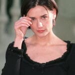 American actress Demi Moore poses for photographer